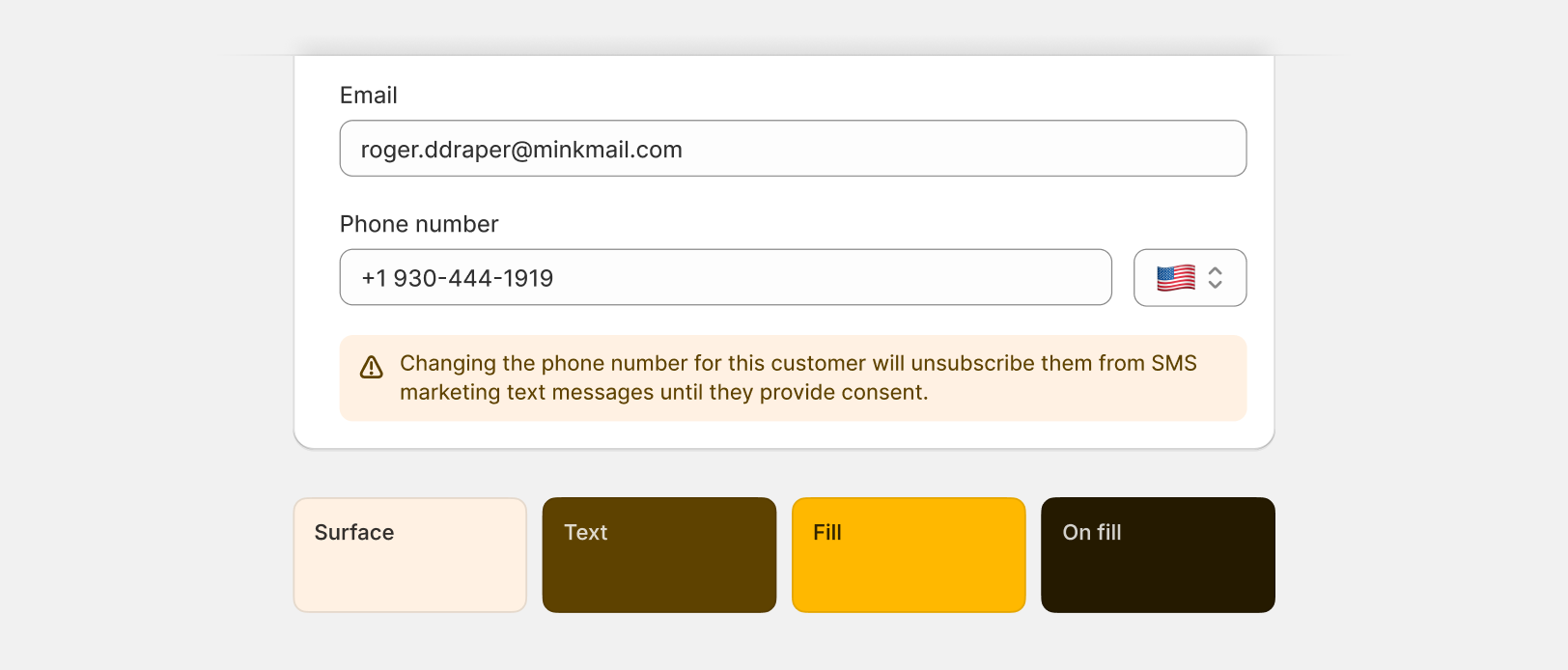 An example of a orange banner with the content "Changing the phone number for this customer will unsubscribe them from SMS marketing text messages until they provide consent".