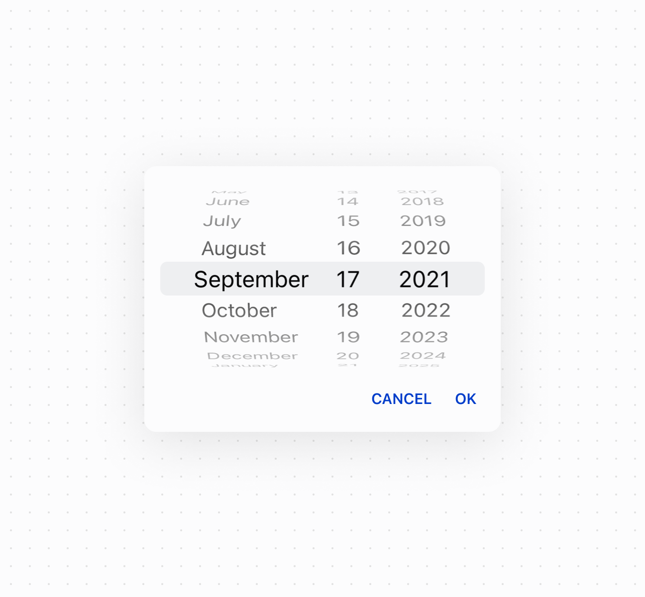 Enable compact date selection using a date spinner component with scrollable columns for month, day, and year. This example shows a basic date spinner for space-constrained layouts.